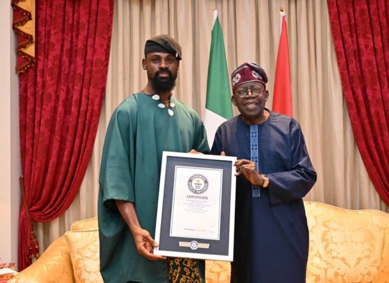 Mixed reactions as Tunde Onakoya visits Tinubu over GWR feat